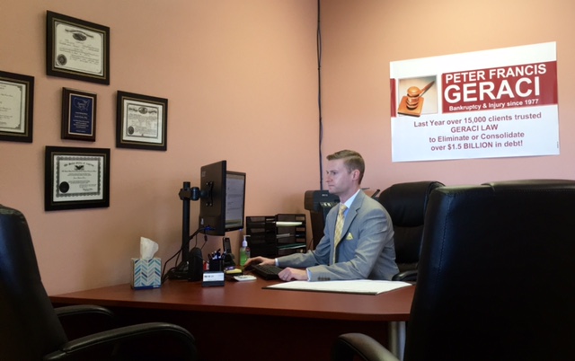 Geraci Law West Dundee Bankruptcy Attorneys image of a lawyer working at his desk.
